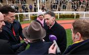 13 March 2025; Trainer Henry de Bromhead is interviewed after he sent out Bob Olinger to win the Paddy Power Stayers' Hurdle during day three of the Cheltenham Racing Festival at Prestbury Park in Cheltenham, England. Photo by Harry Murphy/Sportsfile