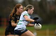 13 March 2025; Caragh McDonald of University of Limerick is tackled by Maeve Stankard of TUS Midwest during the 2025 AIG Lagan Cup final match between TUS Midwest and University of Limerick at Queen's Sport in Belfast. Photo by Shauna Clinton/Sportsfile