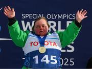 13 March 2025; Lucy Best of Team Ireland, a member of Skiability Northern Ireland, Balinderry, Antrim, celebrates as she was presented with a Gold Medal after the Novice Super G, Division 3, during day five of the Turin 2025 Special Olympics World Winter Games in Sestriere, Italy. Photo by Ray McManus/Sportsfile
