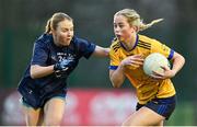 13 March 2025; Aobha Harmon of DCU Dóchas Éireann is tackled by Aine Bresnan of TUD during the 2025 AIG Moynihan Cup final match between TUD CC1 and DCU Dóchas Éireann at Queen's Sport in Belfast. Photo by Shauna Clinton/Sportsfile