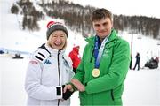 13 March 2025;  Mary Davis, Chief Executive Officer, Special Olympics International, with Caolan McConville of Team Ireland, a member of Skiability Northern Ireland, Aghaghallon, Antrim, who won a Gold Medal in Advanced Super G Event during day five of the Turin 2025 Special Olympics World Winter Games in Sestriere, Italy. Photo by Ray McManus/Sportsfile