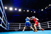13 March 2025; Aoife O’Rourke of Ireland, right,  in action against Aziza Zokirova of Uzbekistan in their 70-75kg Elite Women Quarter-Final bout during the 2025 IBA Women's World Boxing Championships quarter-finals at the Cair Sports Center in Niš, Serbia. Photo by Nikola Krstic/Sportsfile