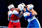 13 March 2025; Aoife O’Rourke of Ireland, left, in action against Aziza Zokirova of Uzbekistan in their 70-75kg Elite Women Quarter-Final bout during the 2025 IBA Women's World Boxing Championships quarter-finals at the Cair Sports Center in Niš, Serbia. Photo by Nikola Krstic/Sportsfile