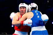 13 March 2025; Aoife O’Rourke of Ireland, left, in action against Aziza Zokirova of Uzbekistan in their 70-75kg Elite Women Quarter-Final bout during the 2025 IBA Women's World Boxing Championships quarter-finals at the Cair Sports Center in Niš, Serbia. Photo by Nikola Krstic/Sportsfile