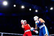 13 March 2025; Aoife O’Rourke of Ireland, left, in action against Aziza Zokirova of Uzbekistan in their 70-75kg Elite Women Quarter-Final bout during the 2025 IBA Women's World Boxing Championships quarter-finals at the Cair Sports Center in Niš, Serbia. Photo by Nikola Krstic/Sportsfile
