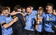 13 March 2025; UCD players including Club captain James Tarrant, centre left, and Chris Hennessy, centre right, celebrate with the cup after their side's victory in the annual men’s Rugby Colours match between Dublin University and UCD at UCD Bowl in Dublin. Photo by Sam Barnes/Sportsfile