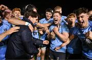 13 March 2025; UCD players including Club captain James Tarrant, centre left, and Chris Hennessy, centre right, celebrate with the cup after their side's victory in the annual men’s Rugby Colours match between Dublin University and UCD at UCD Bowl in Dublin. Photo by Sam Barnes/Sportsfile