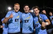 13 March 2025; UCD players Matthew Healy, Dan Barron and Dan Campbell celebrate with the cup after their victory in the annual men’s Rugby Colours match between Dublin University and UCD at UCD Bowl in Dublin. Photo by Sam Barnes/Sportsfile