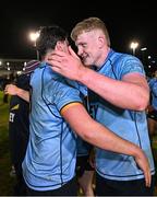 13 March 2025; Conor O'Tighearhaigh, right, and Dan Barron of UCD celebrate after their sides victory in the annual men’s Rugby Colours match between Dublin University and UCD at UCD Bowl in Dublin. Photo by Sam Barnes/Sportsfile