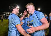 13 March 2025; Conor O'Tighearhaigh, right, and Dan Barron of UCD celebrate after their sides victory in the annual men’s Rugby Colours match between Dublin University and UCD at UCD Bowl in Dublin. Photo by Sam Barnes/Sportsfile