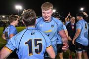 13 March 2025; Conor O'Tighearhaigh, right, and Tim Corkery of UCD celebrate after their sides victory in the annual men’s Rugby Colours match between Dublin University and UCD at UCD Bowl in Dublin. Photo by Sam Barnes/Sportsfile