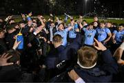 13 March 2025; Chris Hennessy of UCD, centre, leads the celebrations with the cup after their side's victory in the annual men’s Rugby Colours match between Dublin University and UCD at UCD Bowl in Dublin. Photo by Sam Barnes/Sportsfile