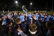 13 March 2025; Chris Hennessy of UCD, centre, leads the celebrations with the cup after their side's victory in the annual men’s Rugby Colours match between Dublin University and UCD at UCD Bowl in Dublin. Photo by Sam Barnes/Sportsfile