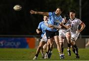 13 March 2025; Evan Moynihan of UCD is tackled by Jack Kearney of Dublin University, right, during the annual men’s Rugby Colours match between Dublin University and UCD at UCD Bowl in Dublin. Photo by Sam Barnes/Sportsfile