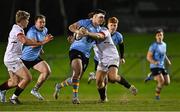 13 March 2025; Hugo O'Malley of UCD is tackled by Louis McDonough of Dublin University during the annual men’s Rugby Colours match between Dublin University and UCD at UCD Bowl in Dublin. Photo by Sam Barnes/Sportsfile