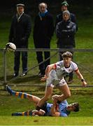 13 March 2025; Matt Lynch of Dublin University is tackled by Tim Corkery of UCD during the annual men’s Rugby Colours match between Dublin University and UCD at UCD Bowl in Dublin. Photo by Sam Barnes/Sportsfile