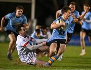 13 March 2025; Tim Corkery of UCD is tackled by Noah Byrne of Dublin University during the annual men’s Rugby Colours match between Dublin University and UCD at UCD Bowl in Dublin. Photo by Sam Barnes/Sportsfile
