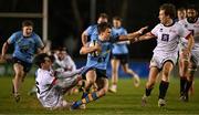 13 March 2025; Tim Corkery of UCD is tackled by Noah Byrne, left, and Louis McDonough of Dublin University during the annual men’s Rugby Colours match between Dublin University and UCD at UCD Bowl in Dublin. Photo by Sam Barnes/Sportsfile