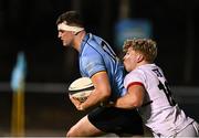13 March 2025; Hugo O'Malley of UCD in action against Hunter Dean Johns of Dublin University during the annual men’s Rugby Colours match between Dublin University and UCD at UCD Bowl in Dublin. Photo by Sam Barnes/Sportsfile