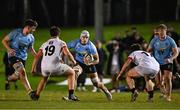 13 March 2025; Gerard Hill of UCD in action against Thomas Davidson, left, and Donie Grehan of Dublin University during the annual men’s Rugby Colours match between Dublin University and UCD at UCD Bowl in Dublin. Photo by Sam Barnes/Sportsfile