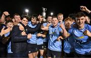 13 March 2025; UCD Club captain James Tarrant, centre left, and Chris Hennessy of UCD, centre right, lift the cup after their victory in the annual men’s Rugby Colours match between Dublin University and UCD at UCD Bowl in Dublin. Photo by Sam Barnes/Sportsfile
