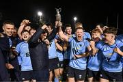 13 March 2025; UCD Club captain James Tarrant, centre left, and Chris Hennessy of UCD, centre right, lift the cup after their victory in the annual men’s Rugby Colours match between Dublin University and UCD at UCD Bowl in Dublin. Photo by Sam Barnes/Sportsfile