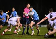 13 March 2025; Robert Gilsenan of UCD in action against Matt Lynch, left, and Tim Hayden of Dublin University during the annual men’s Rugby Colours match between Dublin University and UCD at UCD Bowl in Dublin. Photo by Sam Barnes/Sportsfile
