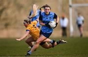 14 March 2025; Ella Parke of UCD gets away from Roinsin Hughes of DCU Dóchas Éireann 2 during the 2025 Ladies HEC Giles Cup semi-final match between UCD and DCU Dóchas Éireann 2 at Queen's Sport in Belfast. Photo by Ben McShane/Sportsfile