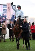 14 March 2025; Jockey Paul Townend, aboard Kargese, celebrates after winning The William Hill County Handicap Hurdle Race on day four of the Cheltenham Racing Festival at Prestbury Park in Cheltenham, England. Photo by Harry Murphy/Sportsfile