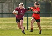 14 March 2025; Muireann Devanney of UG in action against Rachel Sheehan of UCC during the 2025 Ladies AIG HEC O'Connor Cup semi-final match between University College Cork and University of Galway at Queen's Sport, Queens University, Belfast. Photo by Shauna Clinton/Sportsfile