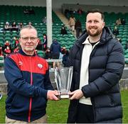 8 March 2025; Treaty United event controller John Devane makes a presentation of Waterford FC chief operating officer Richy Walsh before the SSE Airtricity Women's Premier Division match between Treaty United and Waterford at Markets Field in Limerick. Photo by Piaras Ó Mídheach/Sportsfile