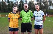 14 March 2025; Referee Shane Curley with Emma Duggan of DCU DÉ captain Emma Duggan, left, and UU Belfast captain Ciara Brown before the 2025 Ladies AIG HEC O'Connor Cup semi-final match between DCU Dóchas Éireann and UU Belfast at Queen's Sport, Queens University, Belfast. Photo by Shauna Clinton/Sportsfile