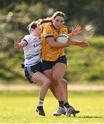14 March 2025; Christina Charters of DCU DÉ in action against Lauren Garland of UU Belfast during the 2025 Ladies AIG HEC O'Connor Cup semi-final match between DCU Dóchas Éireann and UU Belfast at Queen's Sport, Queens University, Belfast. Photo by Shauna Clinton/Sportsfile