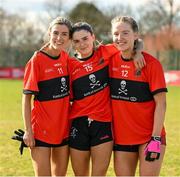 14 March 2025; UCC players, from left, Evie Twomey, Abigail Ring and Brid McMaugh celebrate after their side's victory in the 2025 Ladies AIG HEC O'Connor Cup semi-final match between University College Cork and University of Galway at Queen's Sport, Queens University, Belfast. Photo by Shauna Clinton/Sportsfile