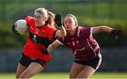 14 March 2025; Emma Morrissey of UCC in action against Saoirse Wynne of UG during the 2025 Ladies AIG HEC O'Connor Cup semi-final match between University College Cork and University of Galway at Queen's Sport, Queens University, Belfast. Photo by Shauna Clinton/Sportsfile