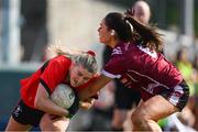 14 March 2025; Emma Morrissey of UCC in action against Saoirse Wynne of UG during the 2025 Ladies AIG HEC O'Connor Cup semi-final match between University College Cork and University of Galway at Queen's Sport, Queens University, Belfast. Photo by Shauna Clinton/Sportsfile