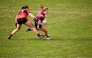 14 March 2025; Muireann Devanney of UG in action against Eve Power of UCC during the 2025 Ladies AIG HEC O'Connor Cup semi-final match between University College Cork and University of Galway at Queen's Sport, Queens University, Belfast. Photo by Shauna Clinton/Sportsfile