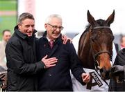 14 March 2025; Part-owner Anthony Bromley, right, celebrates with former jockey Daryl Jacob, after winning The Albert Bartlett  Novices’ Hurdle Race with Jasmin De Vaux on day four of the Cheltenham Racing Festival at Prestbury Park in Cheltenham, England. Photo by Harry Murphy/Sportsfile