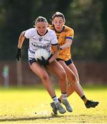 14 March 2025; Ciara Brown of UU Belfast is tackled by Kerri Owens of DCU DÉ during the 2025 Ladies AIG HEC O'Connor Cup semi-final match between DCU Dóchas Éireann and UU Belfast at Queen's Sport, Queens University, Belfast. Photo by Shauna Clinton/Sportsfile