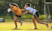14 March 2025; Ciara Durkan of DCU DÉ is tackled by Edel Hagney of UU Belfast during the 2025 Ladies AIG HEC O'Connor Cup semi-final match between DCU Dóchas Éireann and UU Belfast at Queen's Sport, Queens University, Belfast. Photo by Shauna Clinton/Sportsfile