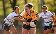 14 March 2025; Emma Duggan of DCU DÉ is tackled by Ciara Brown of UU Belfast during the 2025 Ladies AIG HEC O'Connor Cup semi-final match between DCU Dóchas Éireann and UU Belfast at Queen's Sport, Queens University, Belfast. Photo by Shauna Clinton/Sportsfile