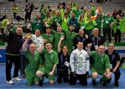 14 March 2025; Team Ireland players and officials celebrate in front of Irish supporters after winning the Bronze place play off, in Floorball, between Special Olympics Ireland and Special Olympics Switzerland during day six of the Turin 2025 Special Olympics World Winter Games in the Inalpi Arena, Turin, Italy. Photo by Ray McManus/Sportsfile