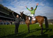 14 March 2025; Jockey Mark Walsh celebrates aboard Inothewayurthinkin, with groom Caoimhe O'Brien, after winning the Boodles Cheltenham Gold Cup Steeple Chase on day four of the Cheltenham Racing Festival at Prestbury Park in Cheltenham, England. Photo by David Fitzgerald/Sportsfile