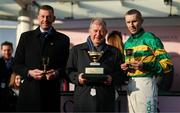 14 March 2025; Trainer Gavin Cromwell, owner JP McManus and jockey Mark Walsh after winning the Boodles Cheltenham Gold Cup Steeple Chase with Inothewayurthinkin on day four of the Cheltenham Racing Festival at Prestbury Park in Cheltenham, England. Photo by Harry Murphy/Sportsfile