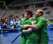 14 March 2025; Frank O'Dwyer, 5, of Team Ireland, a member of Tipperary Special Olympics Club, Ballylandis, Limerick, Damien Kirwan, right, of Team Ireland, a member of Waterford Special Olympics Club, Waterford City, Joseph 'Joe-Joe' Sheehan of Team Ireland, a member of Mallow Special Olympics Club, Doneraile, Cork, celebrate after the Bronze place play off, in Floorball, between Special Olympics Ireland and Special Olympics Switzerland during day six of the Turin 2025 Special Olympics World Winter Games in the Inalpi Arena, Turin, Italy. Photo by Ray McManus/Sportsfile