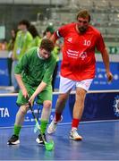 14 March 2025; Frank O' Dwyer of Team Ireland, a member of Tipperary Special Olympics Club, Ballylandis, Limerick, in action against Stefan Niederberger of Special Olympics Switzerland, during the Bronze place play off, in Floorball, between Special Olympics Ireland and Special Olympics Switzerland during day six of the Turin 2025 Special Olympics World Winter Games in the Inalpi Arena, Turin, Italy. Photo by Ray McManus/Sportsfile