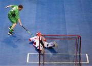 14 March 2025; Frank O' Dwyer of Team Ireland, a member of Tipperary Special Olympics Club, Ballylandis, Limerick, has his shot saved by goalkeeper Pascal Durrer of Special Olympics Switzerland, during the Bronze place play off, in Floorball, between Special Olympics Ireland and Special Olympics Switzerland during day six of the Turin 2025 Special Olympics World Winter Games in the Inalpi Arena, Turin, Italy. Photo by Ray McManus/Sportsfile