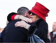 14 March 2025; Noreen McManus, wife of winning owner JP McManus, celebrates with trainer Gavin Cromwell after winning the Boodles Cheltenham Gold Cup Steeple Chase with Inothewayurthinkin on day four of the Cheltenham Racing Festival at Prestbury Park in Cheltenham, England. Photo by Harry Murphy/Sportsfile