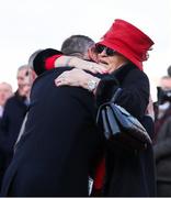 14 March 2025; Noreen McManus, wife of winning owner JP McManus, celebrates with trainer Gavin Cromwell after winning the Boodles Cheltenham Gold Cup Steeple Chase with Inothewayurthinkin on day four of the Cheltenham Racing Festival at Prestbury Park in Cheltenham, England. Photo by Harry Murphy/Sportsfile