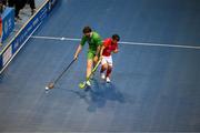 14 March 2025; Gavin Bourke of Team Ireland, a member of Mallow Special Olympics Club, Doneraile, Cork, is tackled by André Manuel De Azebedo Pinto of Special Olympics Switzerland during the Bronze medal play off on day six of the Turin 2025 Special Olympics World Winter Games in the Inalpi Arena, Turin, Italy. Photo by Ray McManus/Sportsfile